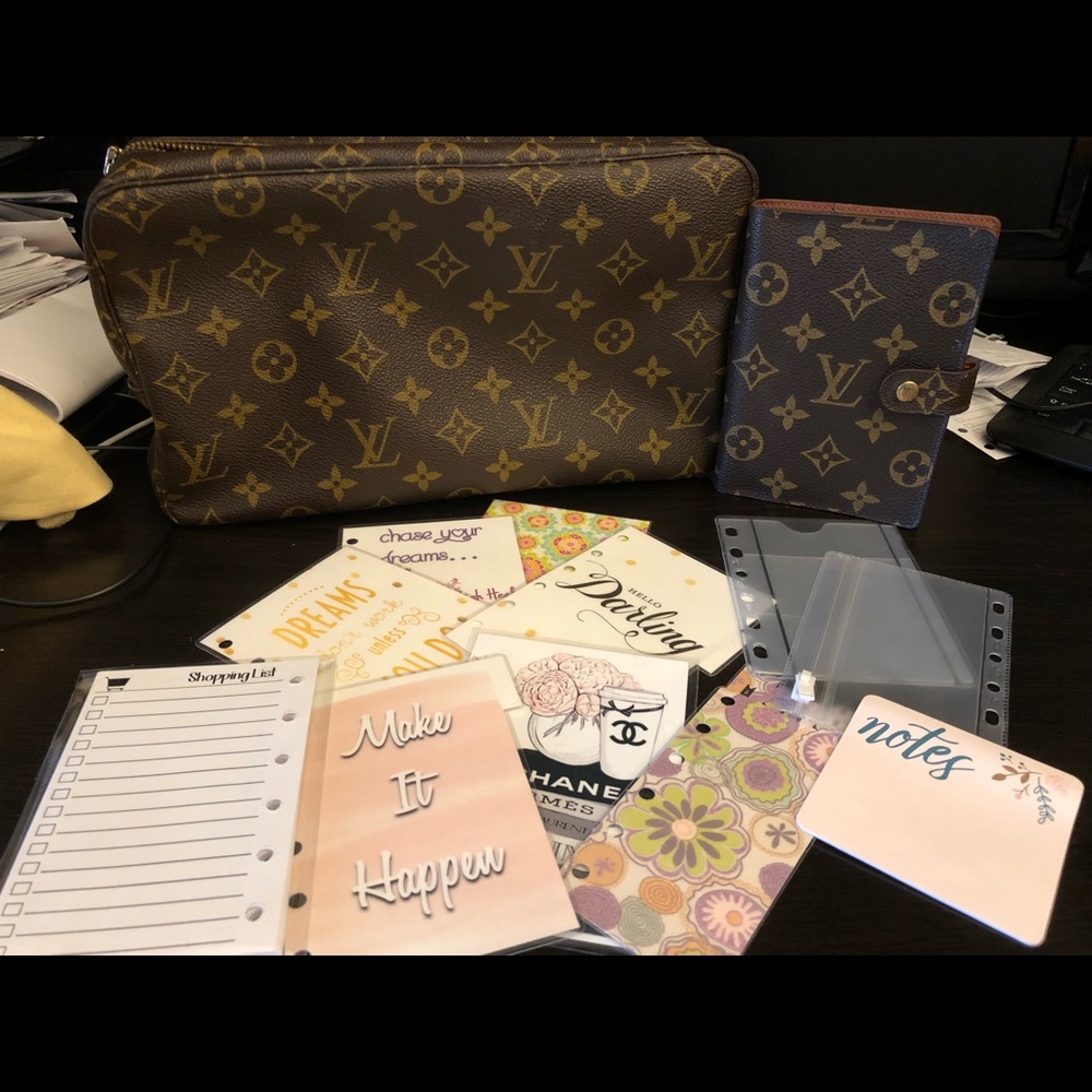 Louis Vuitton pm agenda and LV makeup pouch.